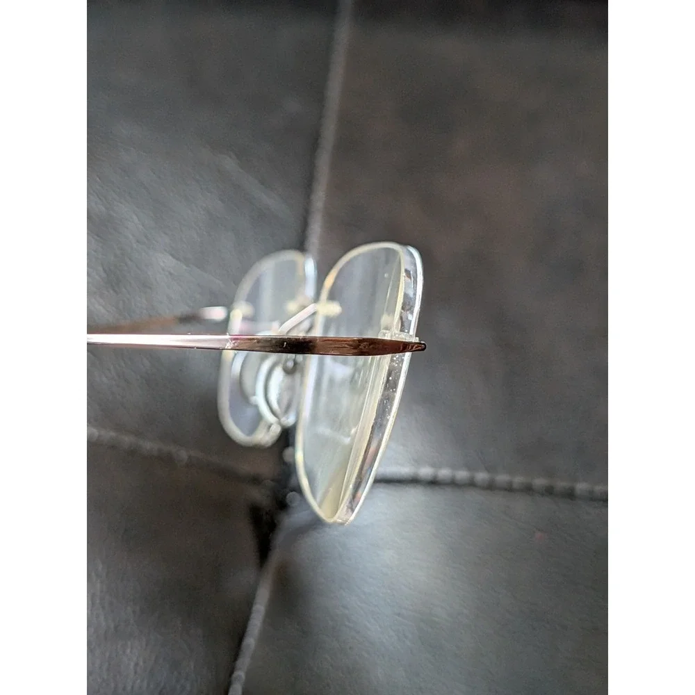 Silhouette Eyeglasses 7799 40 6102 Titan Rimless Frame Austria 49[]19 150